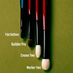 Sonia G makeup brushes Flat Definer, Builder Pro, Crease Two, Worker Two, photographed on a deep green background